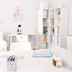 Background image of empty white doctors office interior in modern private clinic, copy space